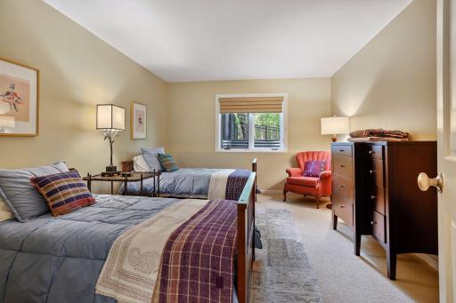 Lower level offers four spacious bedrooms plus three baths & the gathering room.