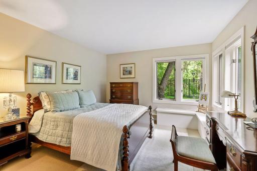 This bedroom catches the morning sun as well as views of the pond.