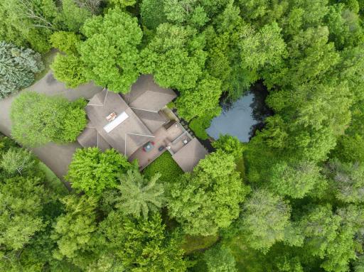 Aerial view of 1698 Dodd Road capturing the private setting