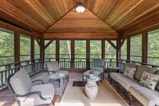 Screened Gazebo offers pull down movie screen for summer evening enjoyment