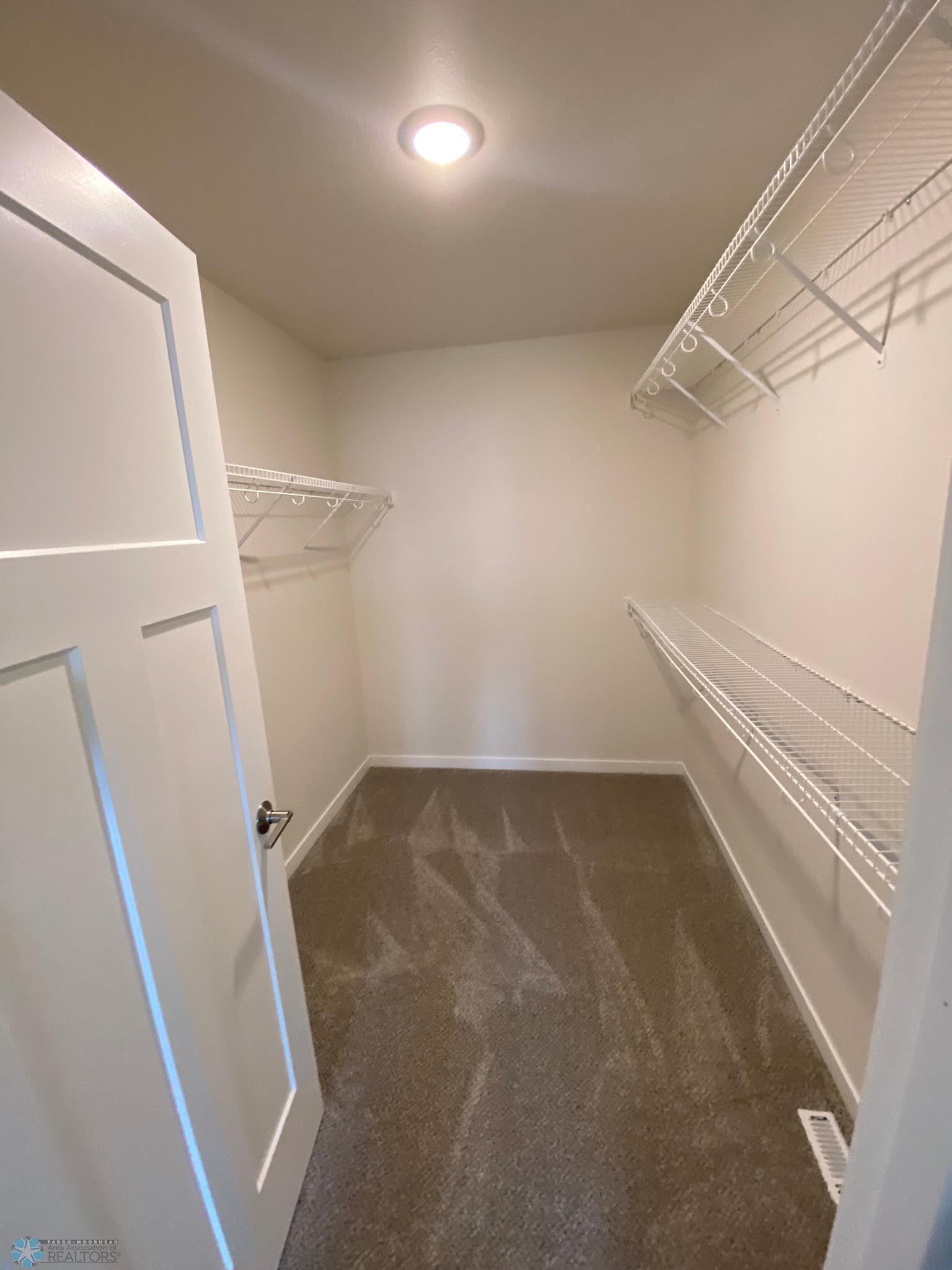 Primary Bedroom Walk-in Closet