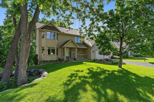 Picturesque lake Marion views, lush trees, and perennial gardens.