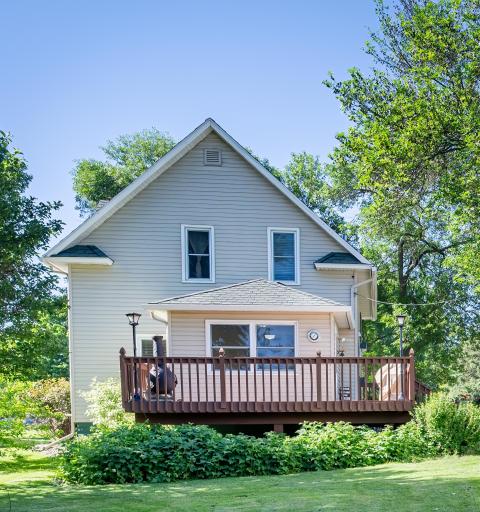 Deck freshly painted, private overlooks back yard. There is a pear tree, apple tree, rhubarb plants and raspberry bushes.