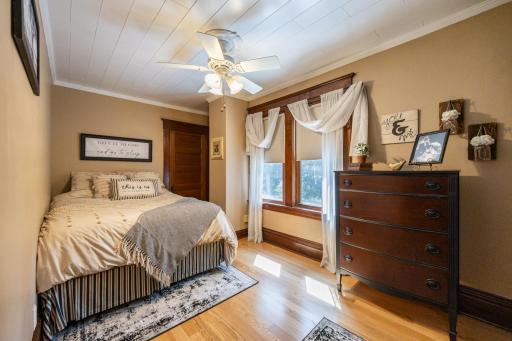 Bedroom upstairs with dual lighted closets.