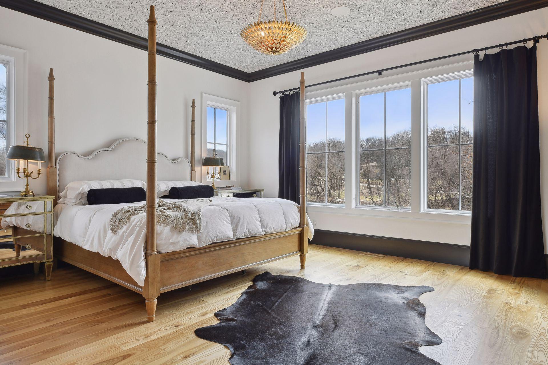 primary bedroom with great views of lake