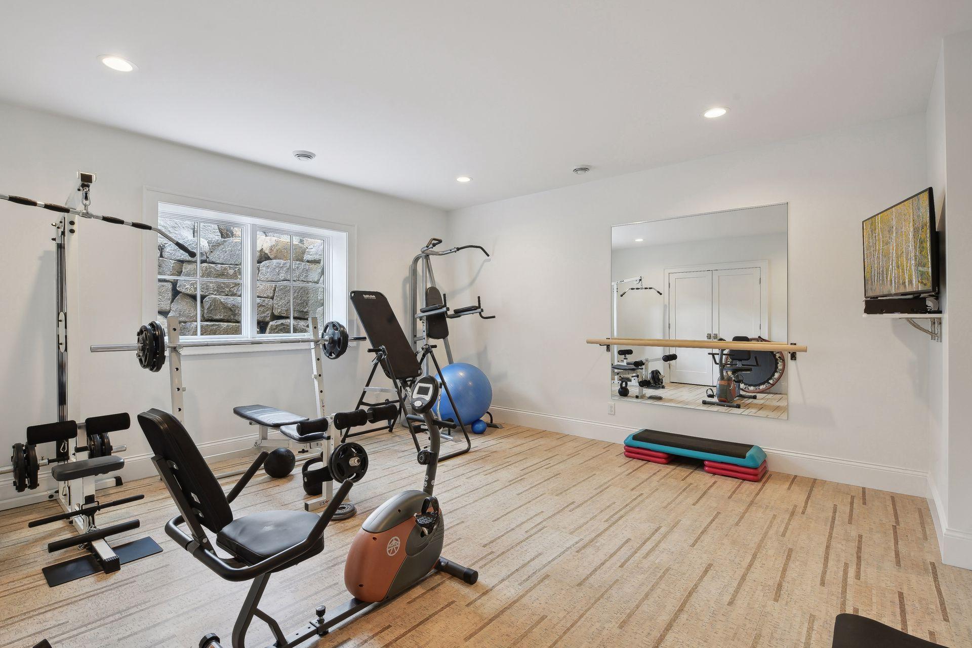 lower bedroom being used as an exercise space