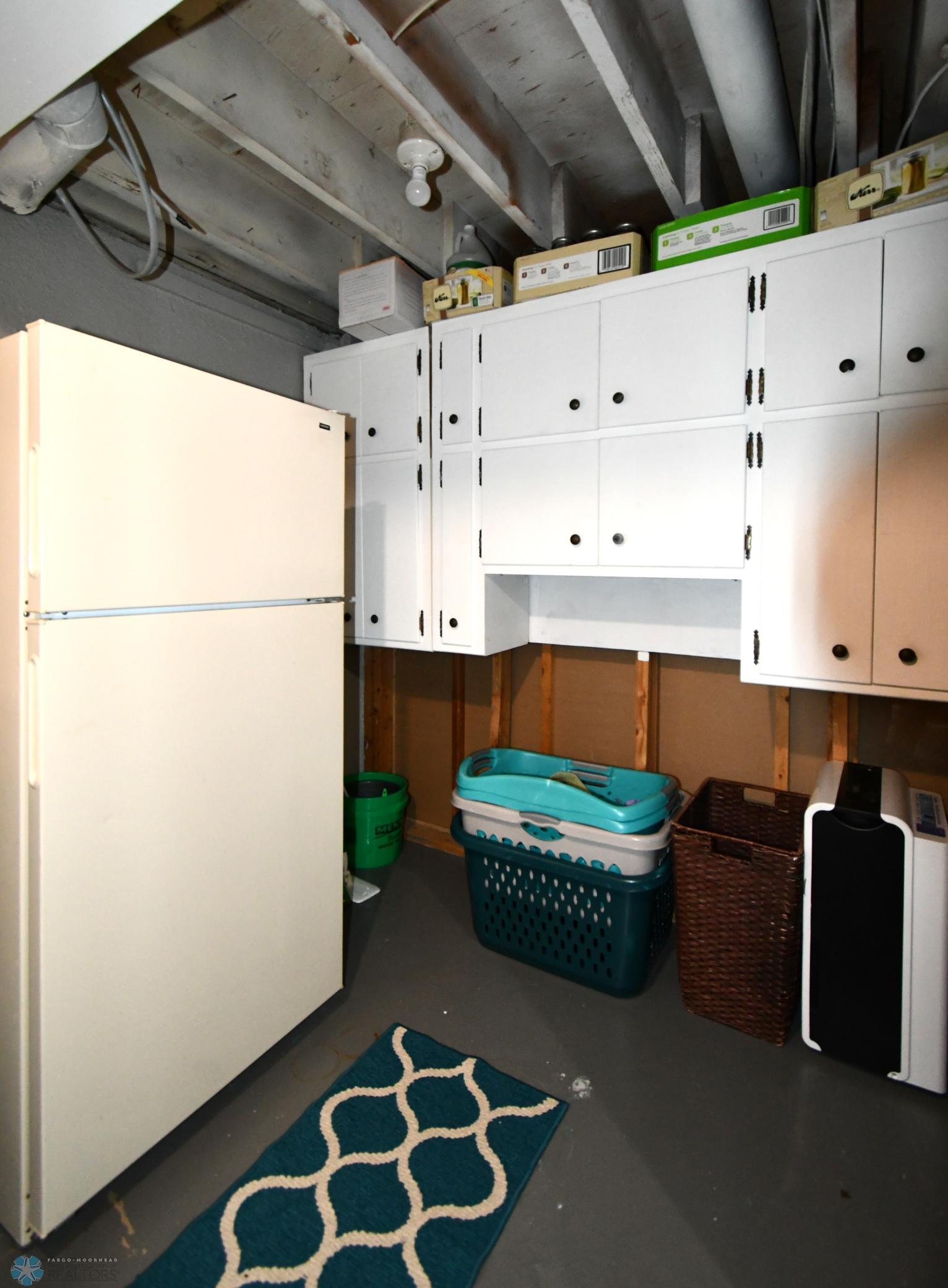19 Bsmt Laundry Storage.JPG