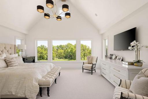 Enjoy a tranquil Primary Suite that takes advantage of the views while offering you a peaceful space for rest and relaxation.