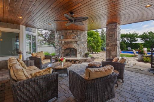 Covered Patio with wood burning fireplace - Lower Level
