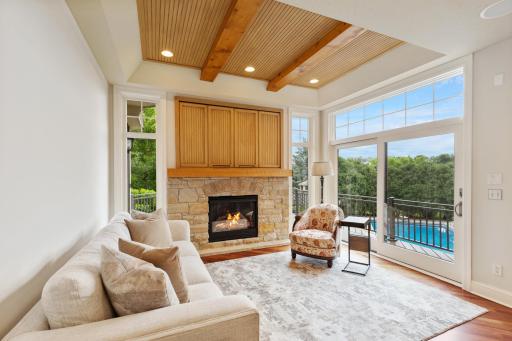 Sunroom with walkout to Deck and Pool Area