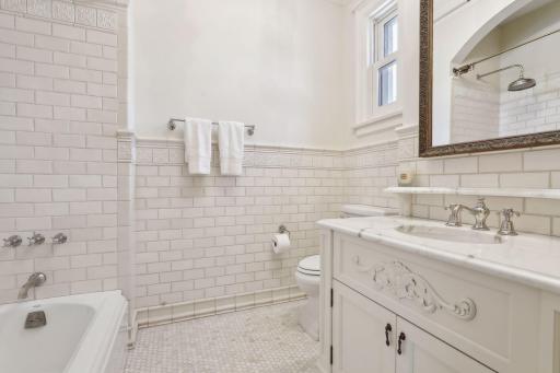 Ensuite bathroom has marble tiled floors with in-floor radiant heat.