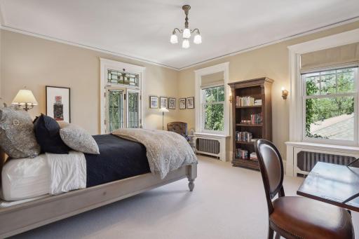 This bedroom has an ensuite bathroom and attached 3-seaon porch.