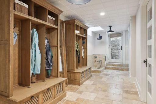 Mudroom has a pet shower is conveniently located near the garage.