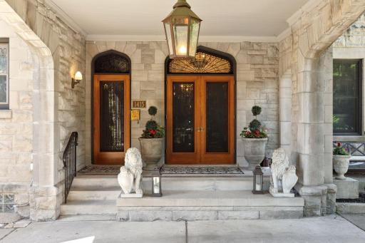 Original, decorative wrought iron on the mahogany doors in the vestibule are gorgeous. 2nd entrance also has decorative wrought ironis. It is the original servant's entrance.