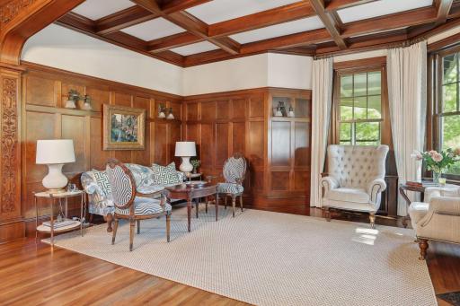 Large sitting room is overlooks the front patio.