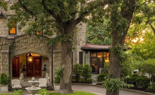 Three-season porch (on the right) has a separate entrance and walks out to large, private patio. Perfect for summer entertaining.