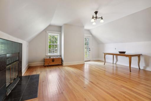 Carriage house apartment living space. Note fireplace is not operational. Finished sq ft excludes the carriage house.