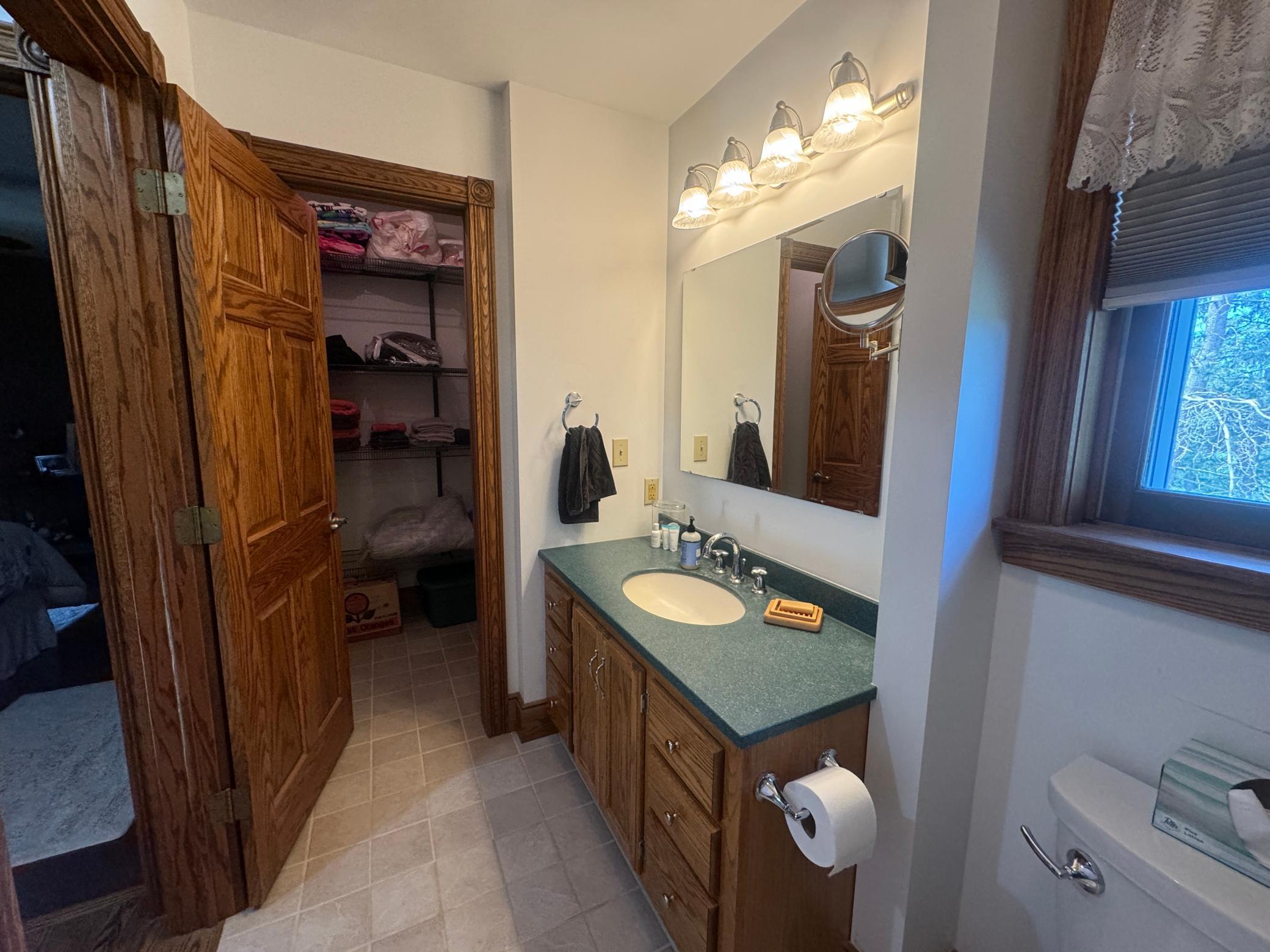 Upstairs 3/4 Bath with large Walk-in Closet