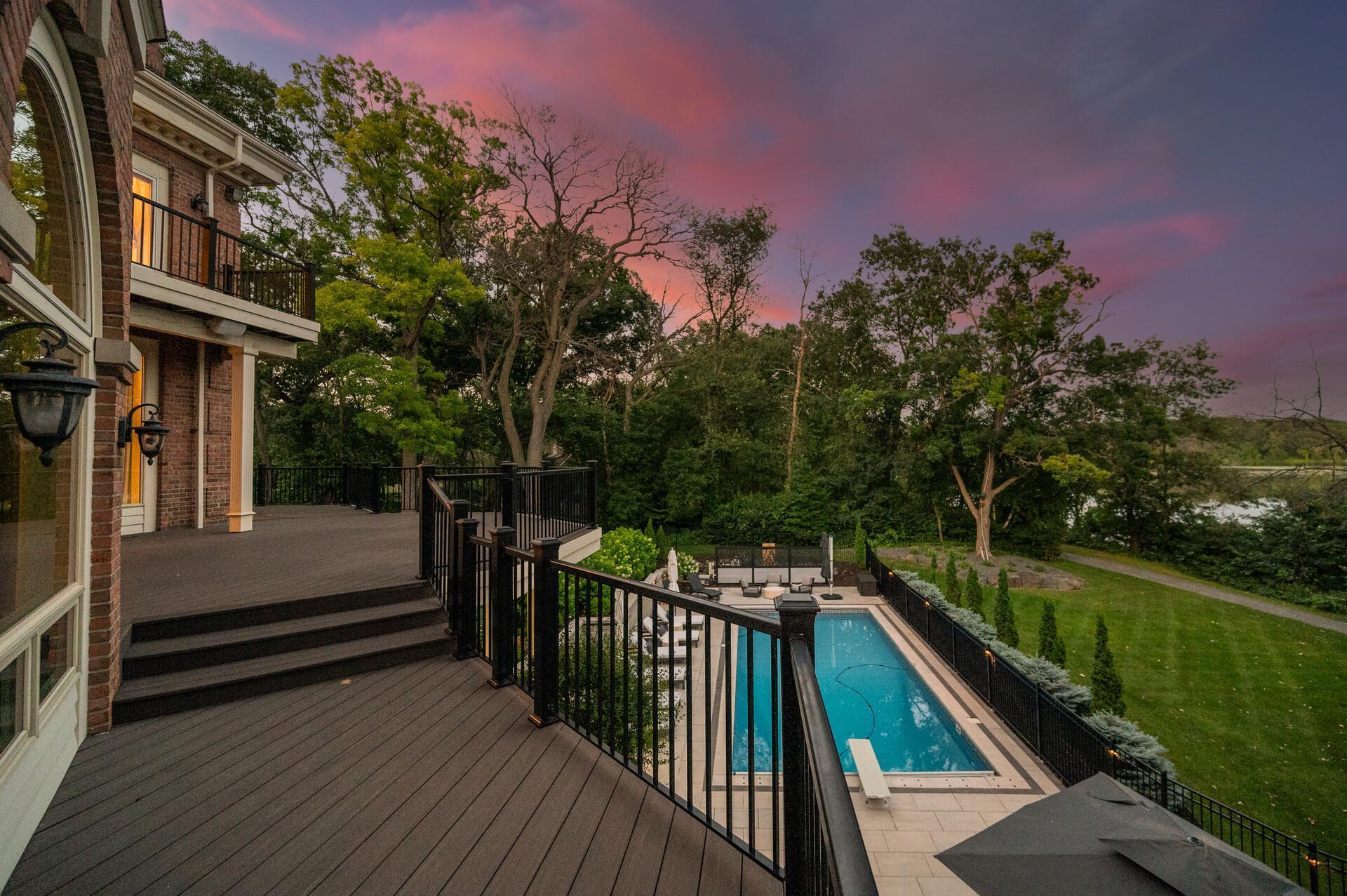 Sprawling maintenance free decking and iron rails