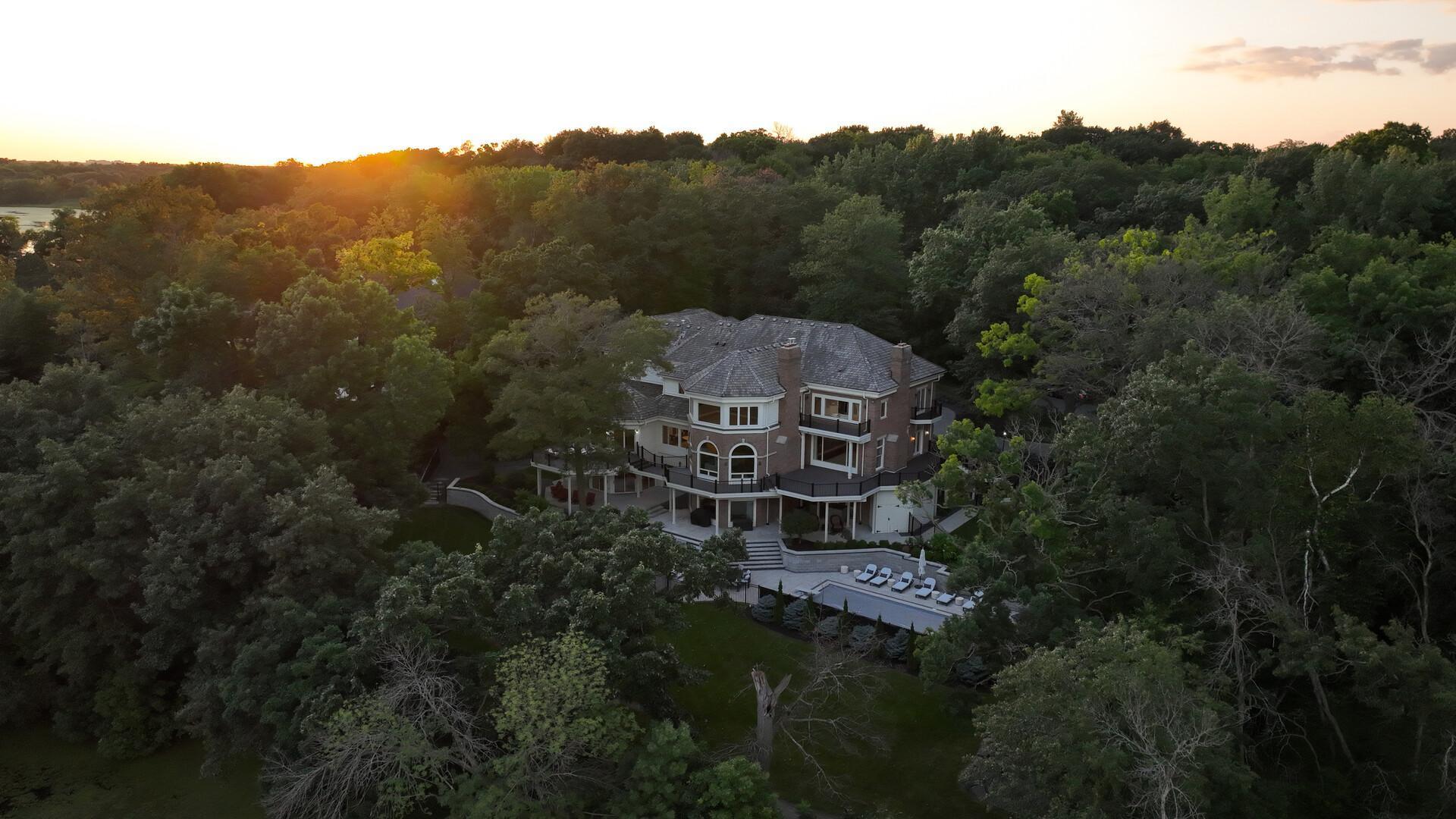 Experience unparalleled luxury living in this magnificent lakefront residence.