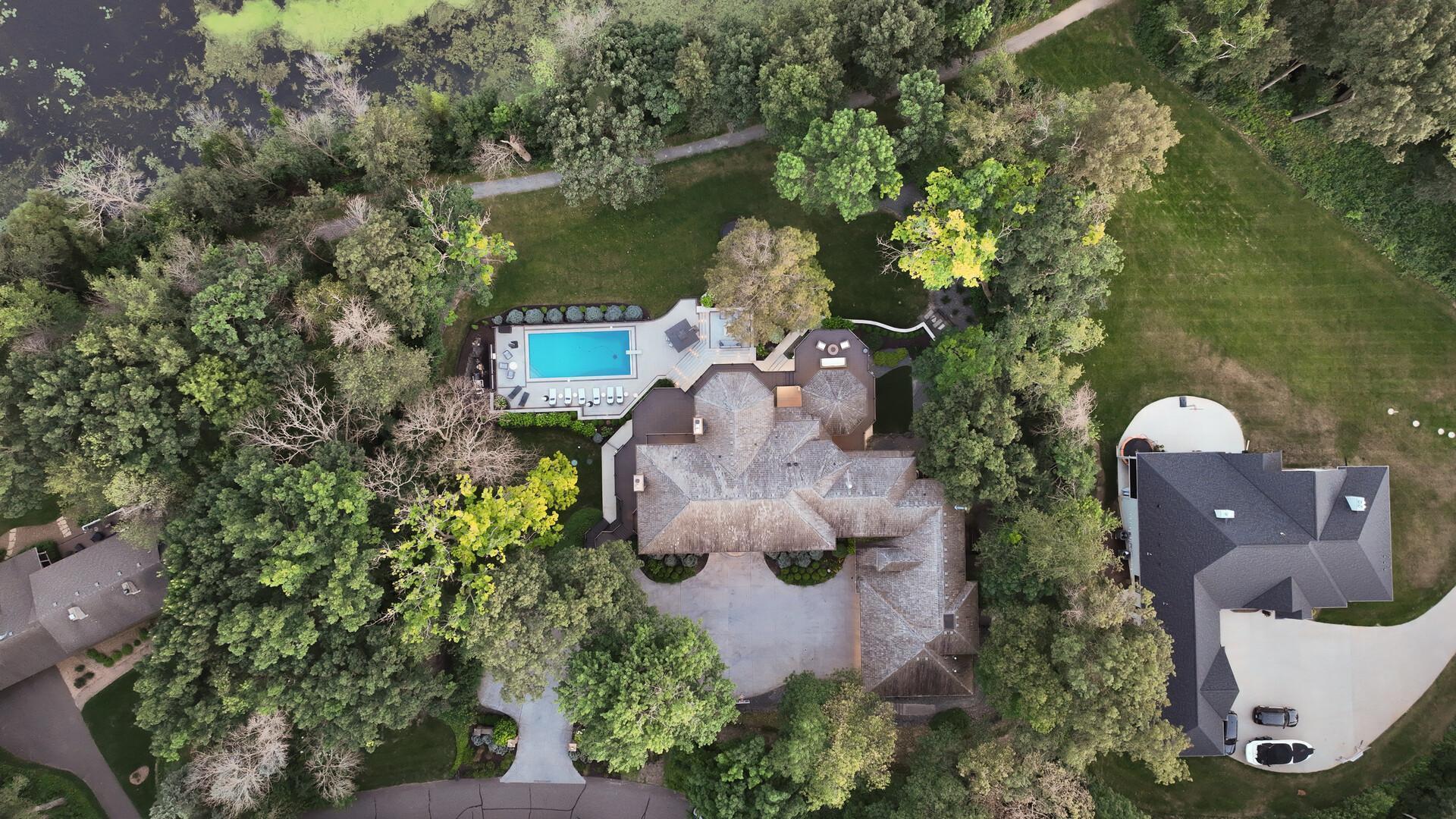 Aerial View: 7 bed, 9 bath custom home with elevated renovations throughout