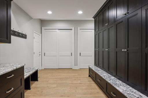 Custom Cabinetry and Storage throughout