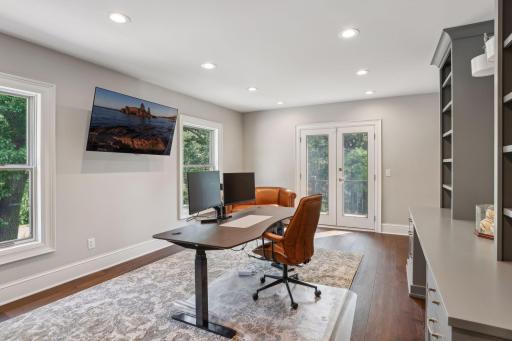 Renovated Office includes two walls of Custom Built Ins