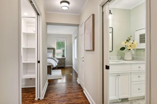 The primary suite includes a walk-in closet and stunning bathroom.