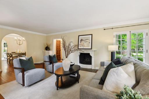 The spacious living room features a gas fireplace.
