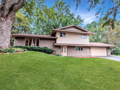Completely updated exterior-Anderson Windows, newer roof and Maintenance Free Siding.