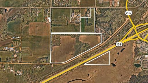 108+ Acres Guided Commercial / Light Industrial located near the proposed new Interchange at Hwy 169 & 282.