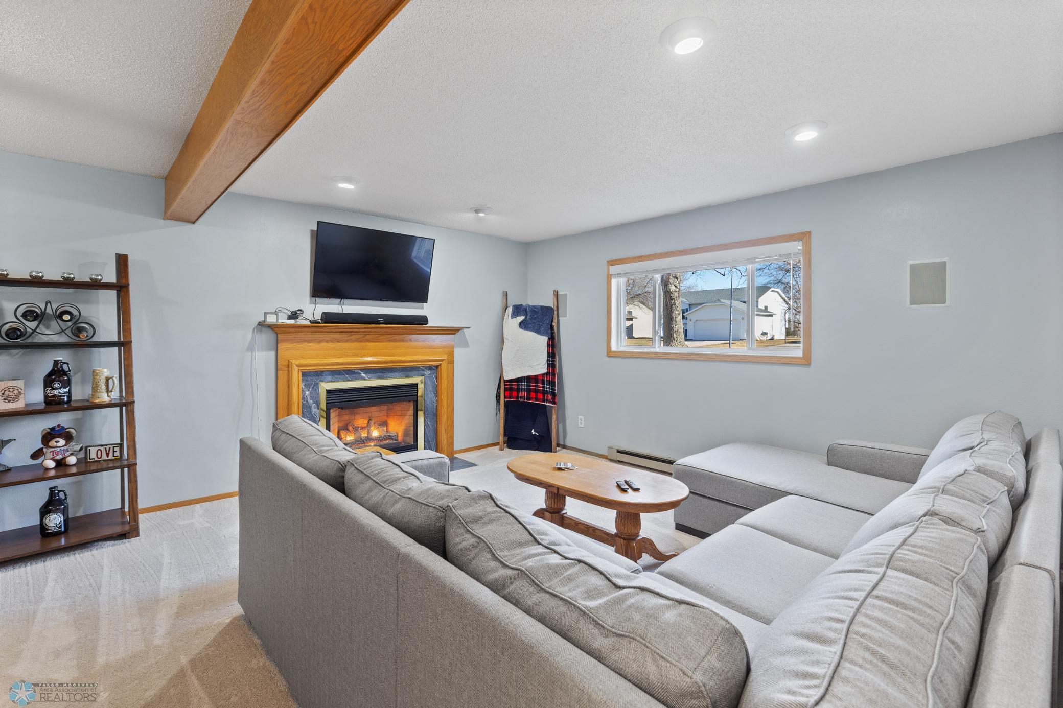 Lower level Living Room w/ Gas Fireplace