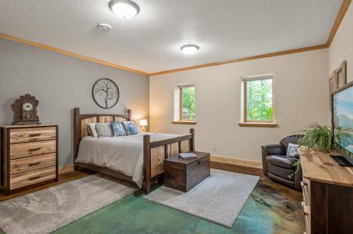 Bedroom #2 on the lower level has a bonus laundry hook up in the closet and heated concrete floors.