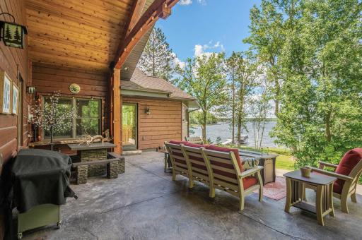 Partially covered stamped concrete patio is accessed through the kitchen or garage. This expansive space is 32 x 21 and overlooks the backyard and lake.