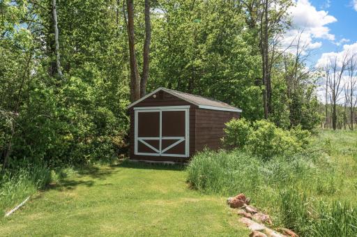 A 18x10 boathouse conveniently located down by the water for extra storage.
