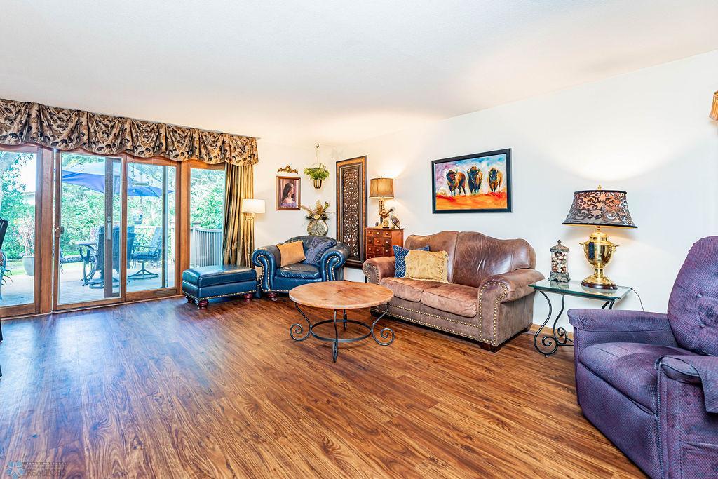 Spacious Living Room with Door to Backyard