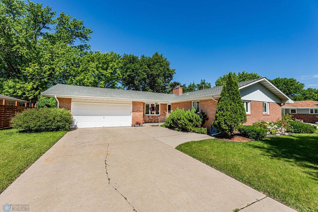 Brick Rambler with Treed Lot