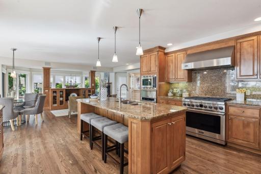 Kitchen open to the family room, sun room and dinette, all with stunning views of the lake