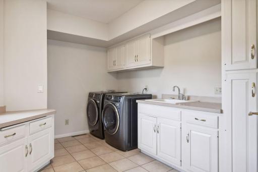 Main floor laundry with new Electrolux washer and dryer