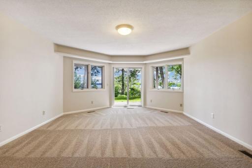 2nd of 3 bedrooms, walkout to patio and new carpet