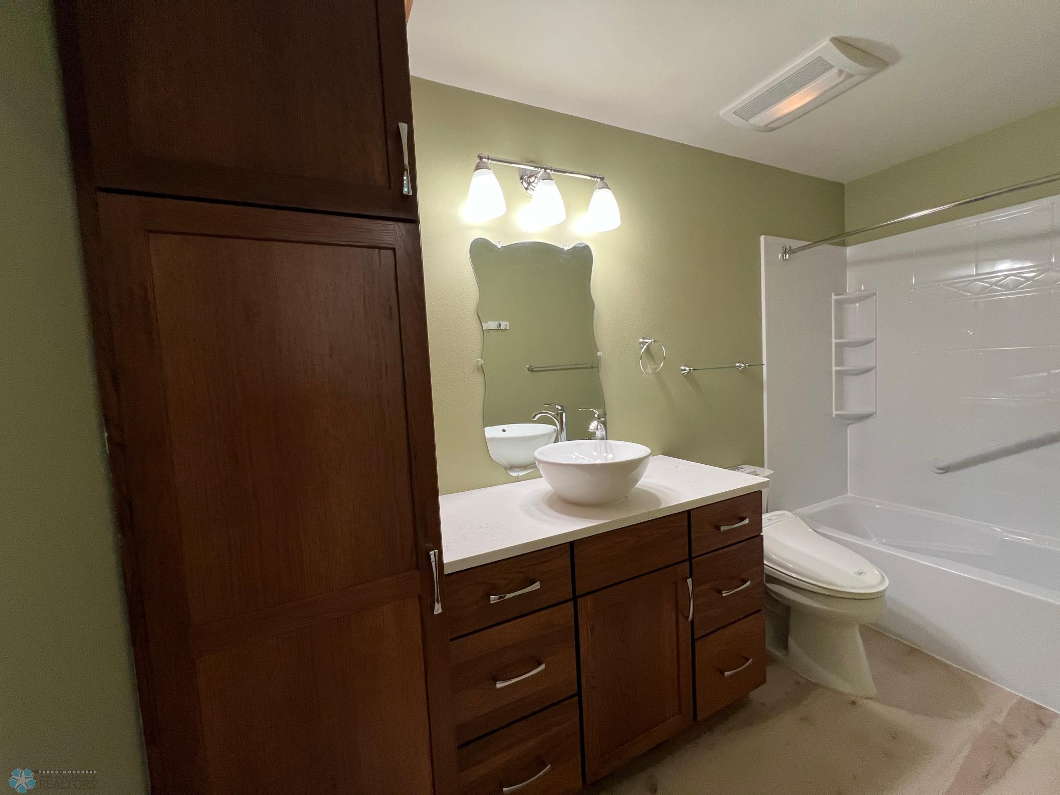 New quartz countertop, sink, bidet, and paint