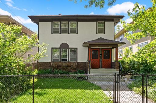 Welcoming up/down duplex with fully fenced yard and loaded with upgrades