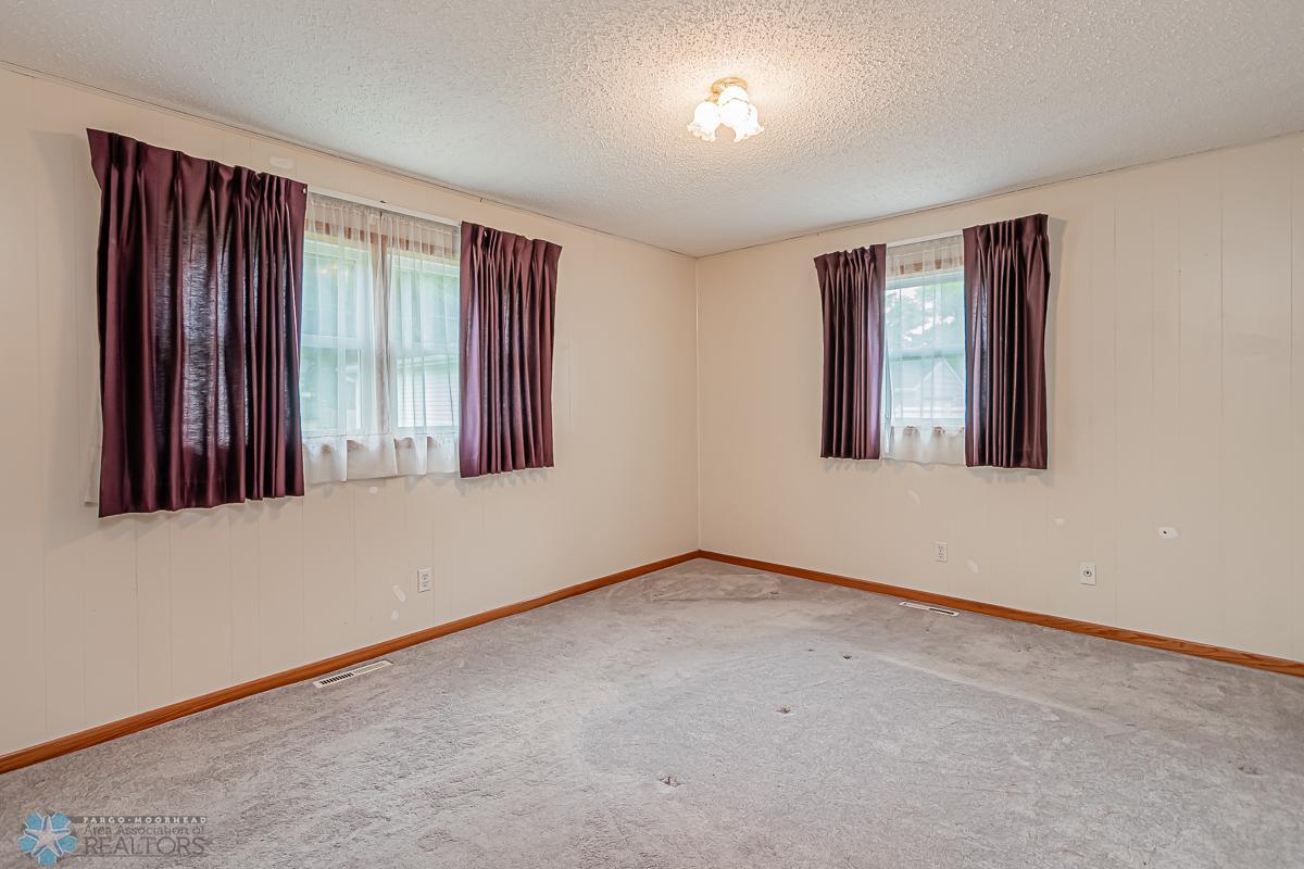 Primary Bedroom with newer windows