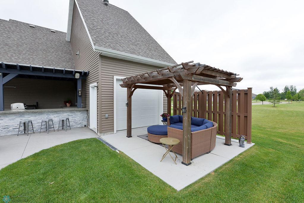 Backyard Sitting Area With Pergola