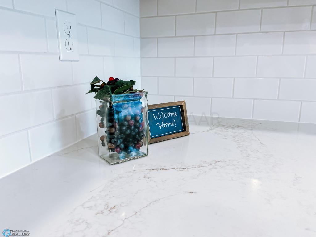 Quartz Counter & Tile Backsplash.jpeg