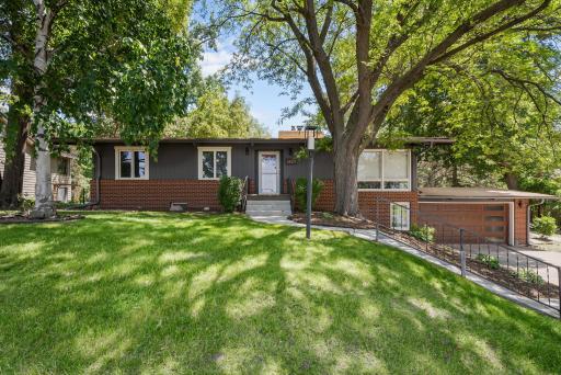 Mid-century modern home on .91 acers within walking distance to Medicine Lake.