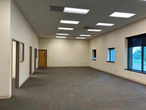 Open work space with three private offices