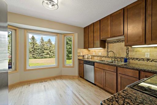 Enjoy these Andersen Bay windows while you cook andover look your spacious back yard!