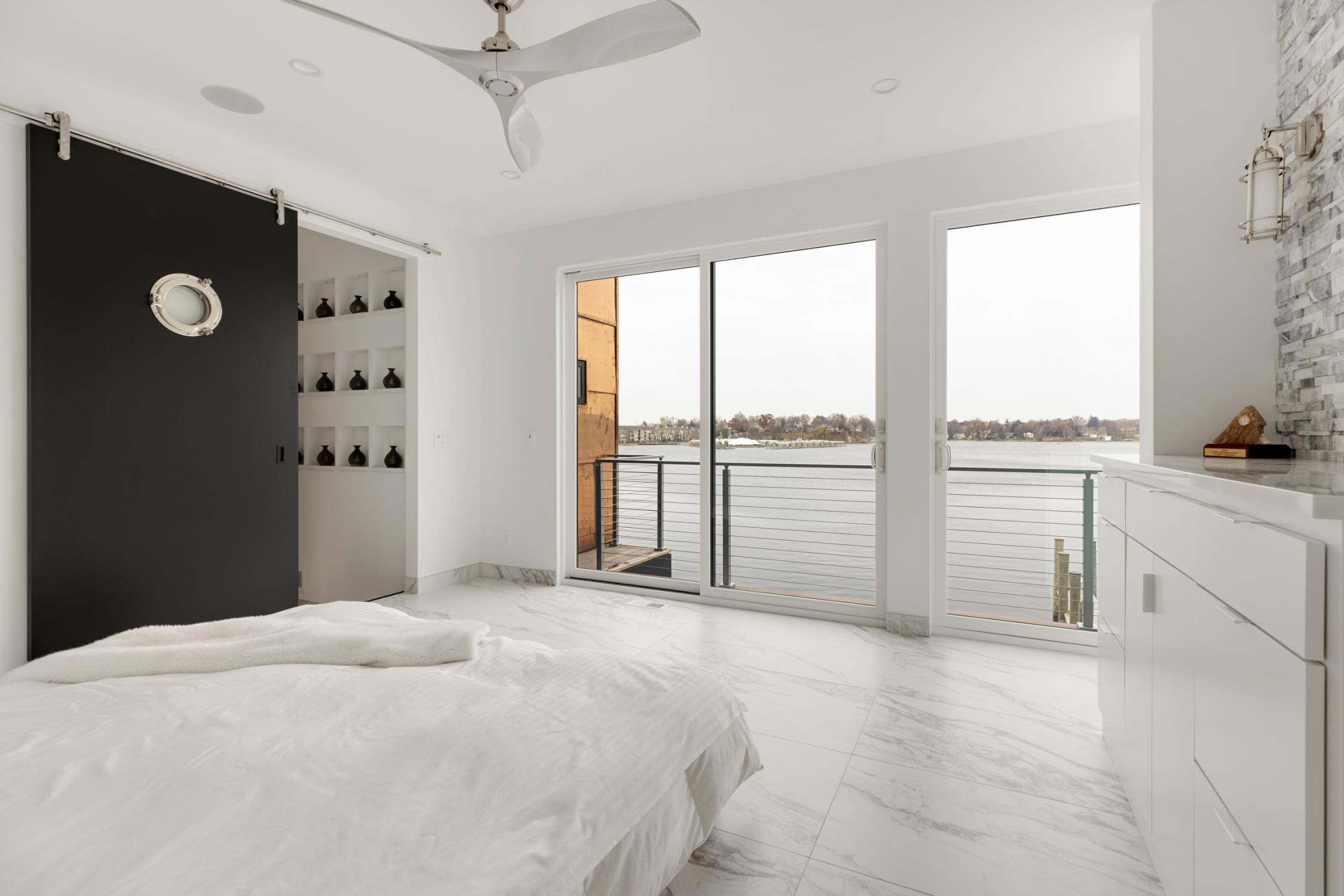 The primary bedroom has automatic blinds and is wired for a fold-down TV if you so desire!