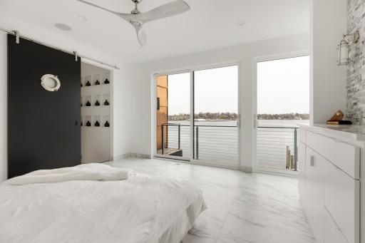The primary bedroom has automatic blinds and is wired for a fold-down TV if you so desire!